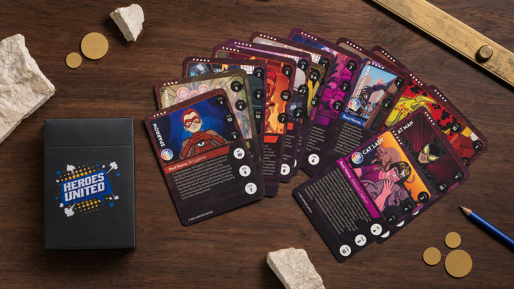 Colossal Man: Heroes United card box and illustrated character cards displayed as a complete card-game collection.