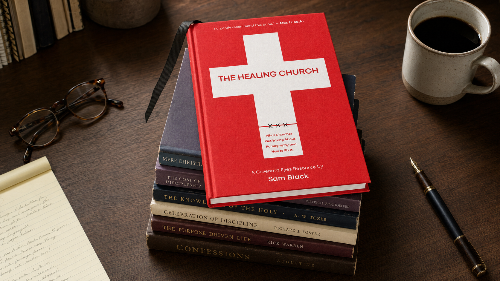The Healing Church by Sam Black resting on a pastor's desk above a stack of familiar Christian books.